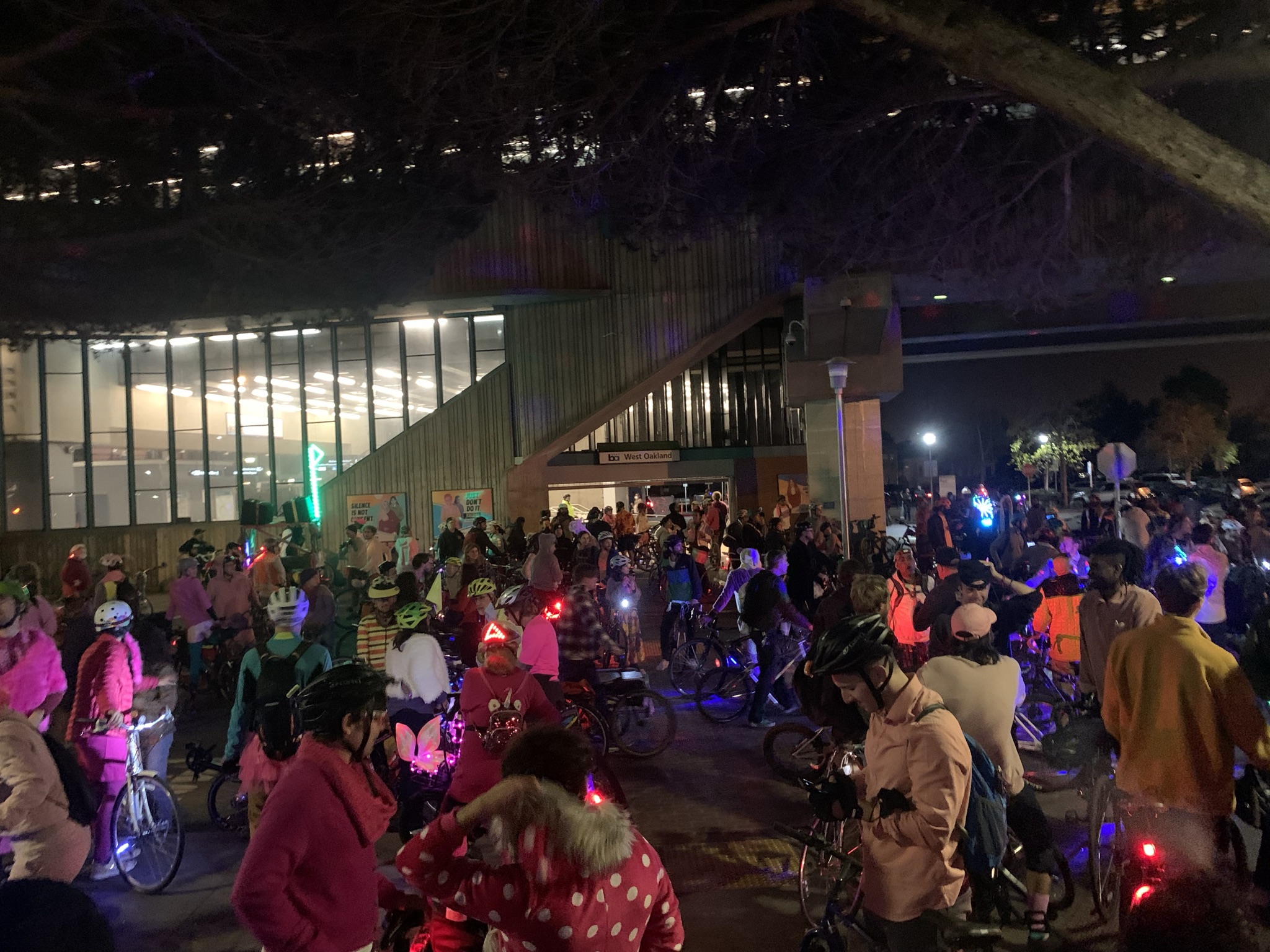 A slice of East Bay Bike Party gathering at West Oakland BART on November 12, 2021.